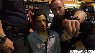 Two officers take into custody a guy then fuck him (part 1) - gay porn